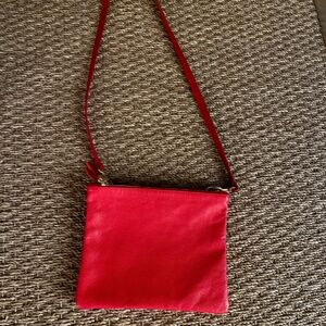 Clare V red shoulder bag.